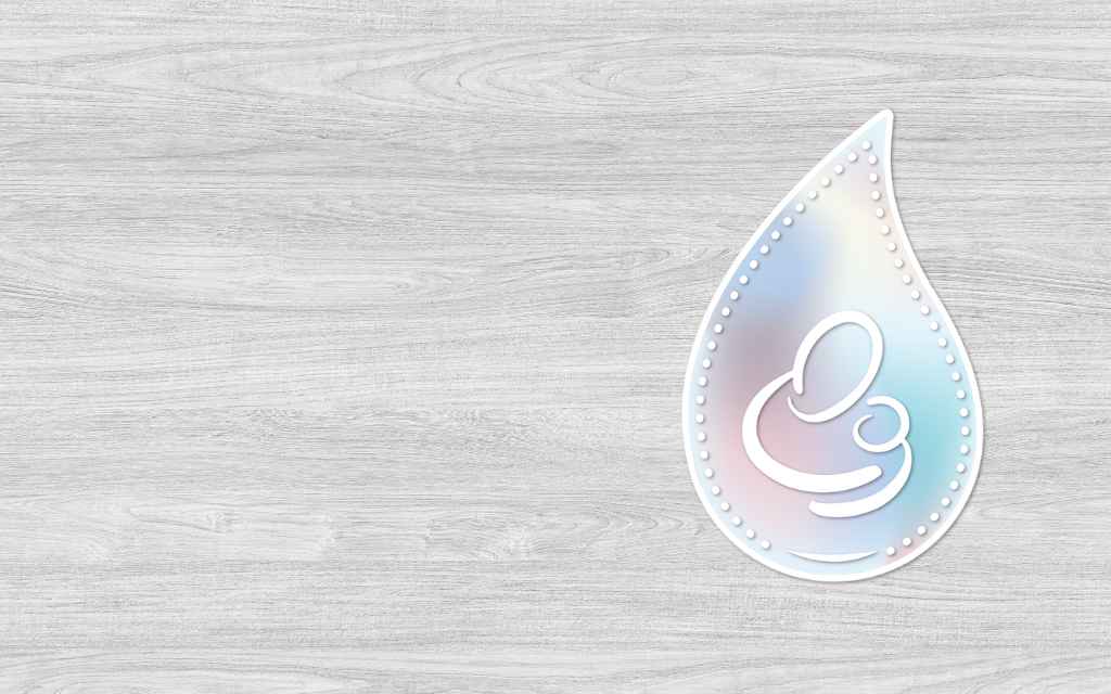 Pregnancy After Loss Logo - icon of a person cradling an infant set in a pastel multi-coloured droplet - on a light grey wooden background