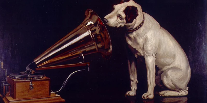 "Dog Looking at and Listening to a Phonograph, 'His Master's Voice', The Original RCA Music Puppy Dog Logo Symbol for Advertising" by Beverly & Pack is licensed under CC BY 2.0.