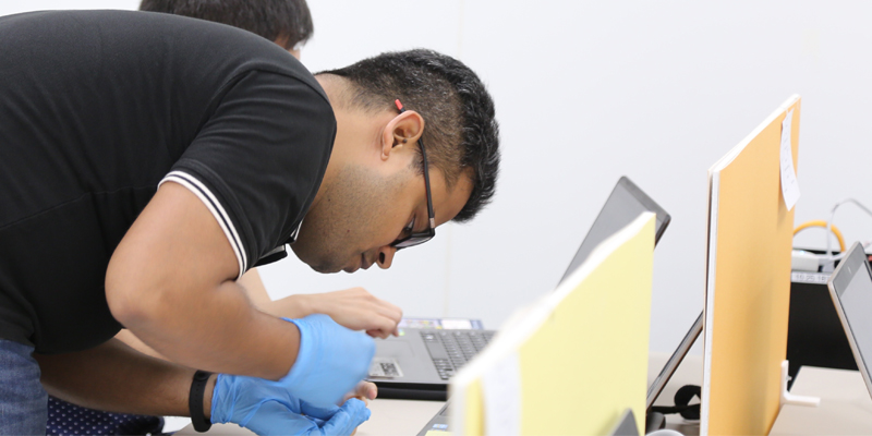 Male researcher working in a research area