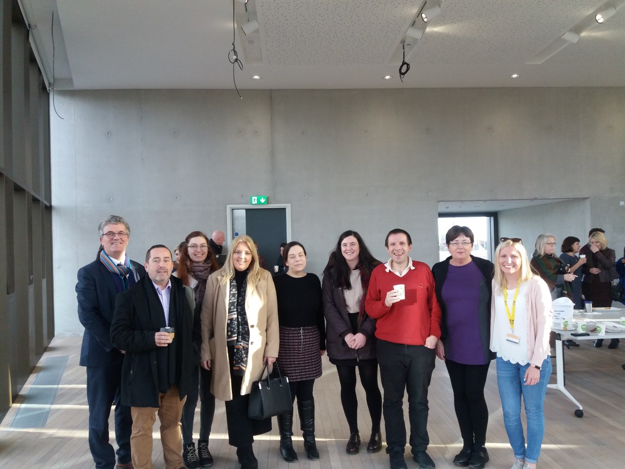 Staff from the International Office enjoying a Christmas coffee morning in the new Hub building.  
 