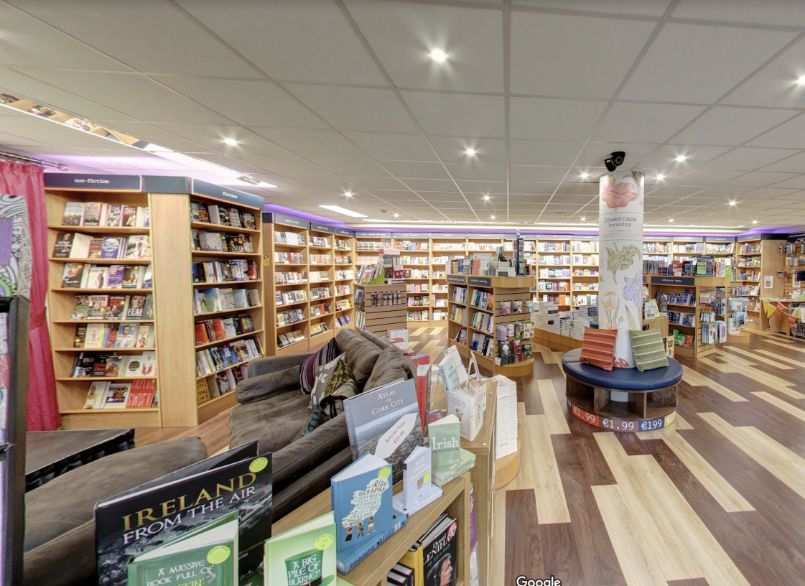 Lowercase Bookshop shelves filled with books and very large comfy brown sofas