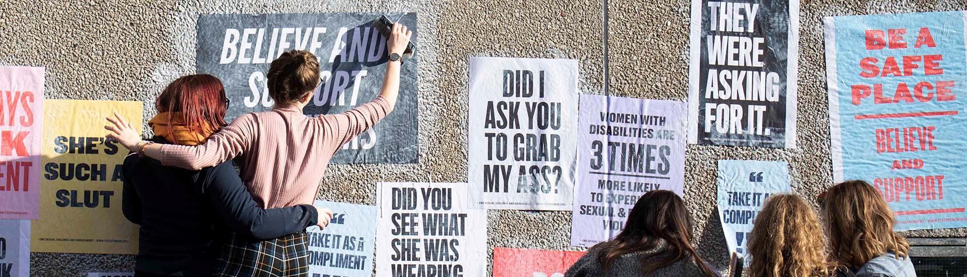 Students putting up posters