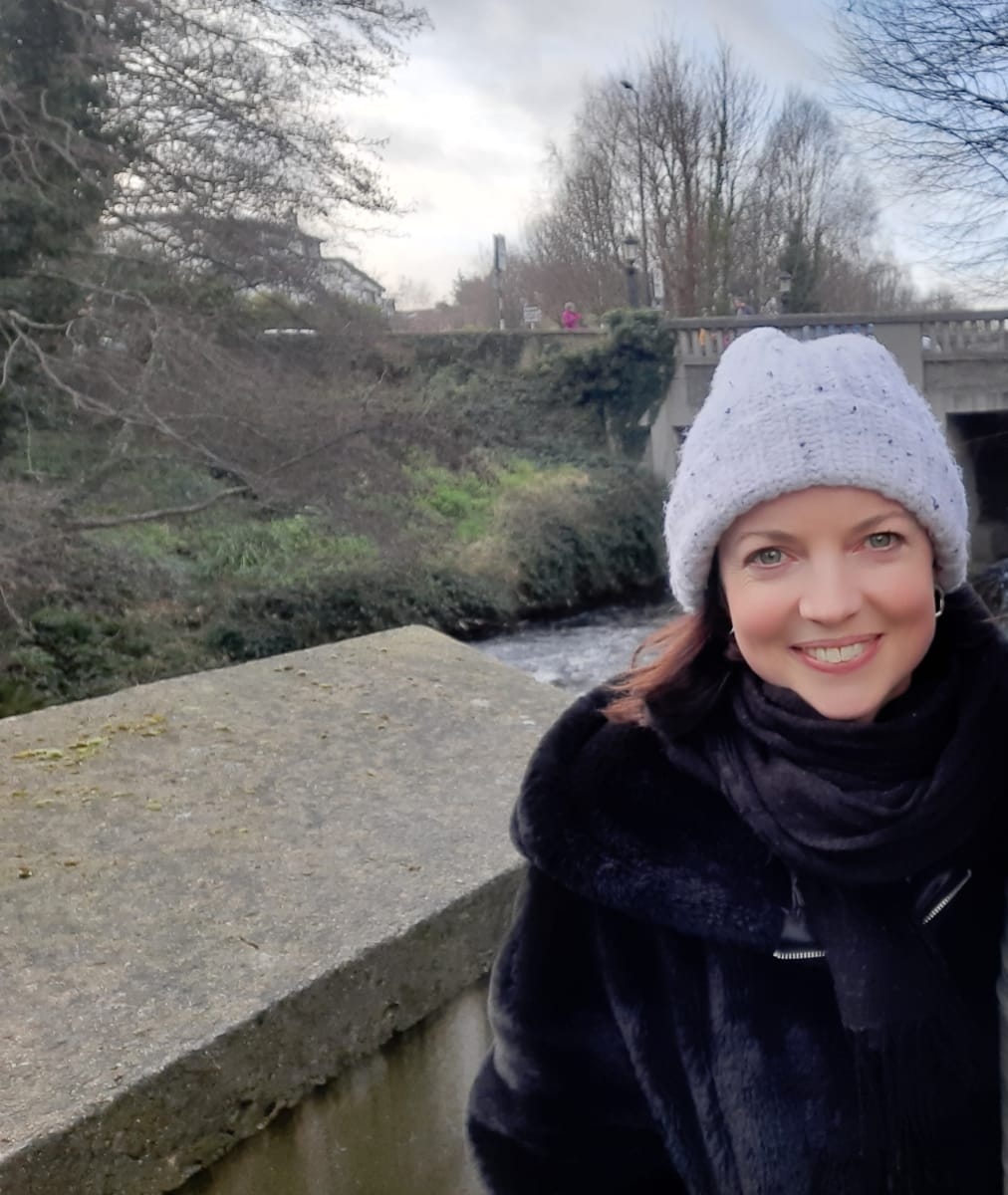 Woman wearing grey hat