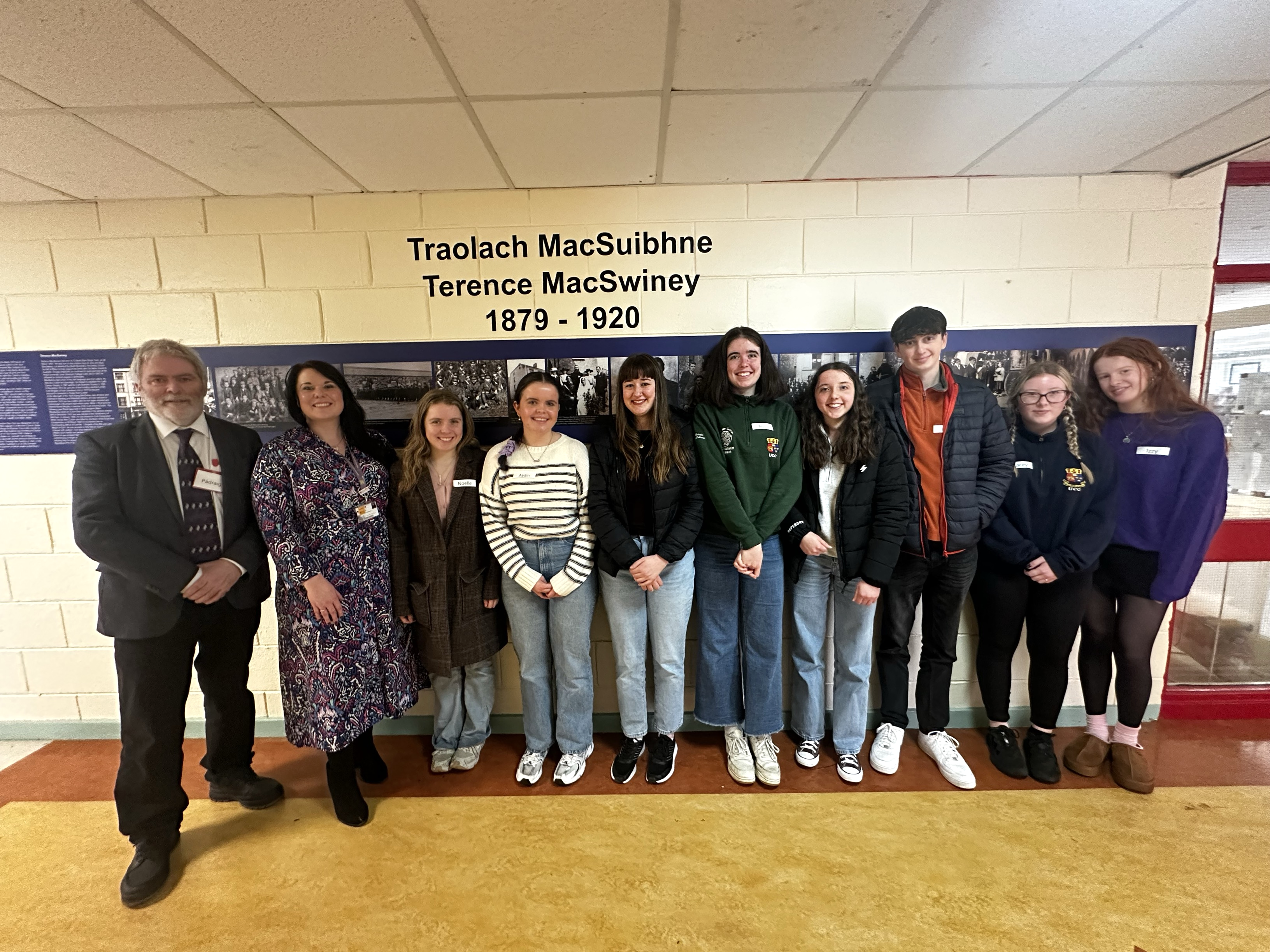 Professor Pádraig Ó Macháin, Ionad na Gaeilge Labhartha, UCC ; Adel Coleman, UCC;  along with eight UCC students who facilitated the event.