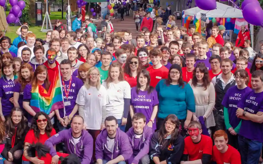 A group of UCC students celebrating the university's student societies