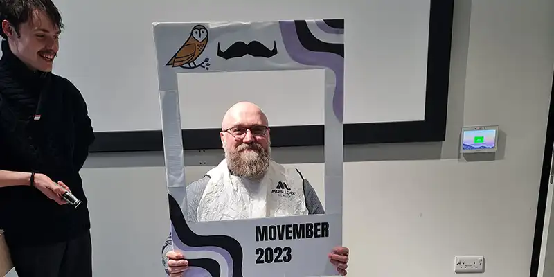 Student prepares to shave Gary Mulcahys beard for Movember charity