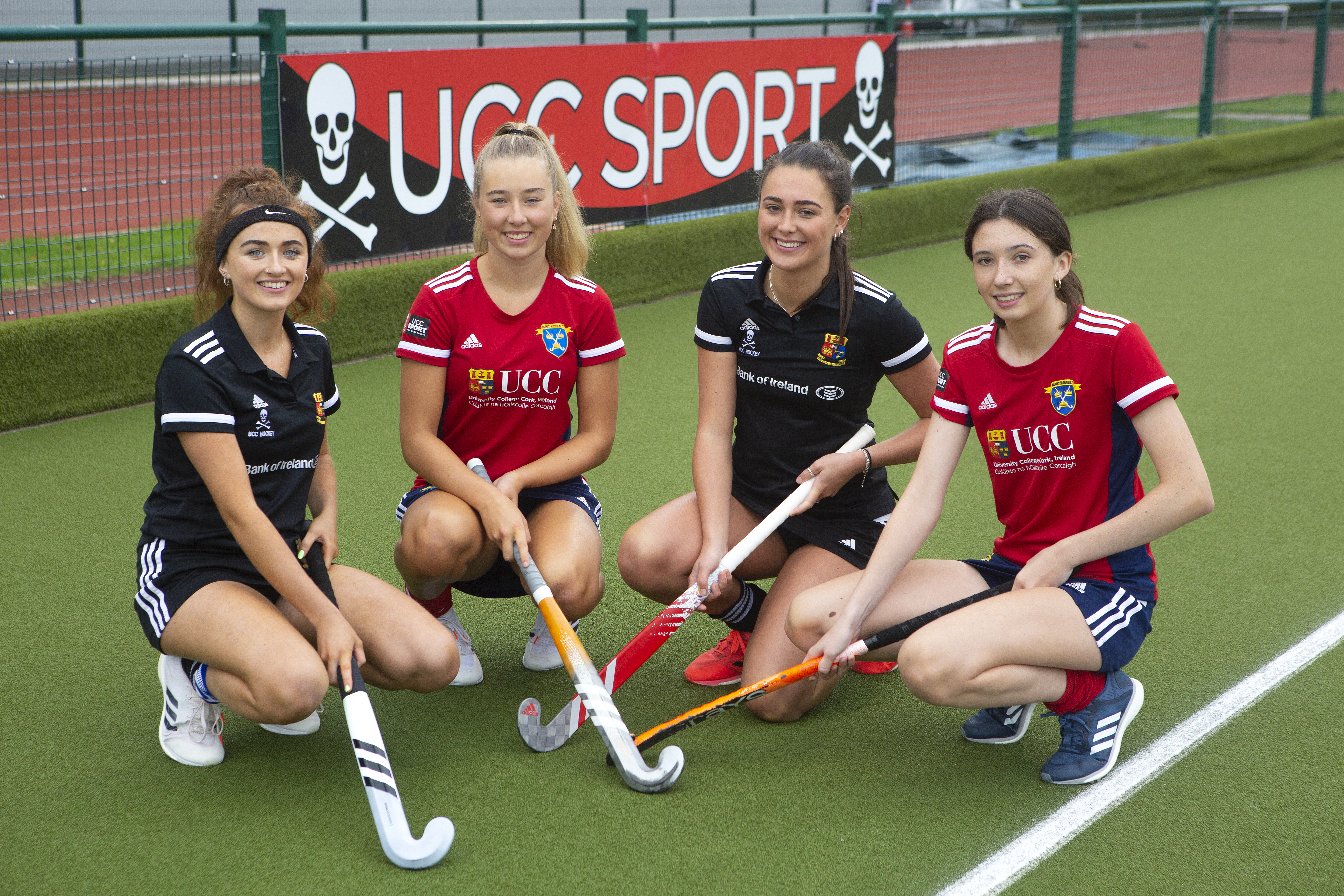 Munster hockey players alongside UCC Senior Ladies Hockey playersplayers