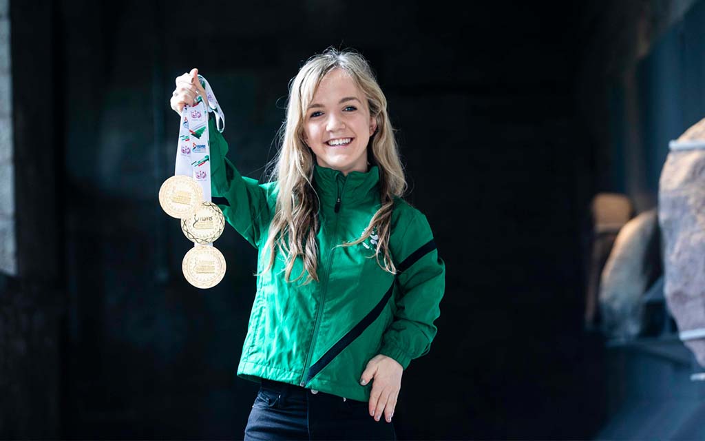 Olympian and student presents her medals 