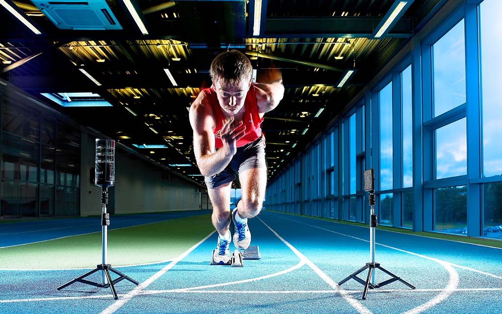 Athlete sprinting on an indoor track