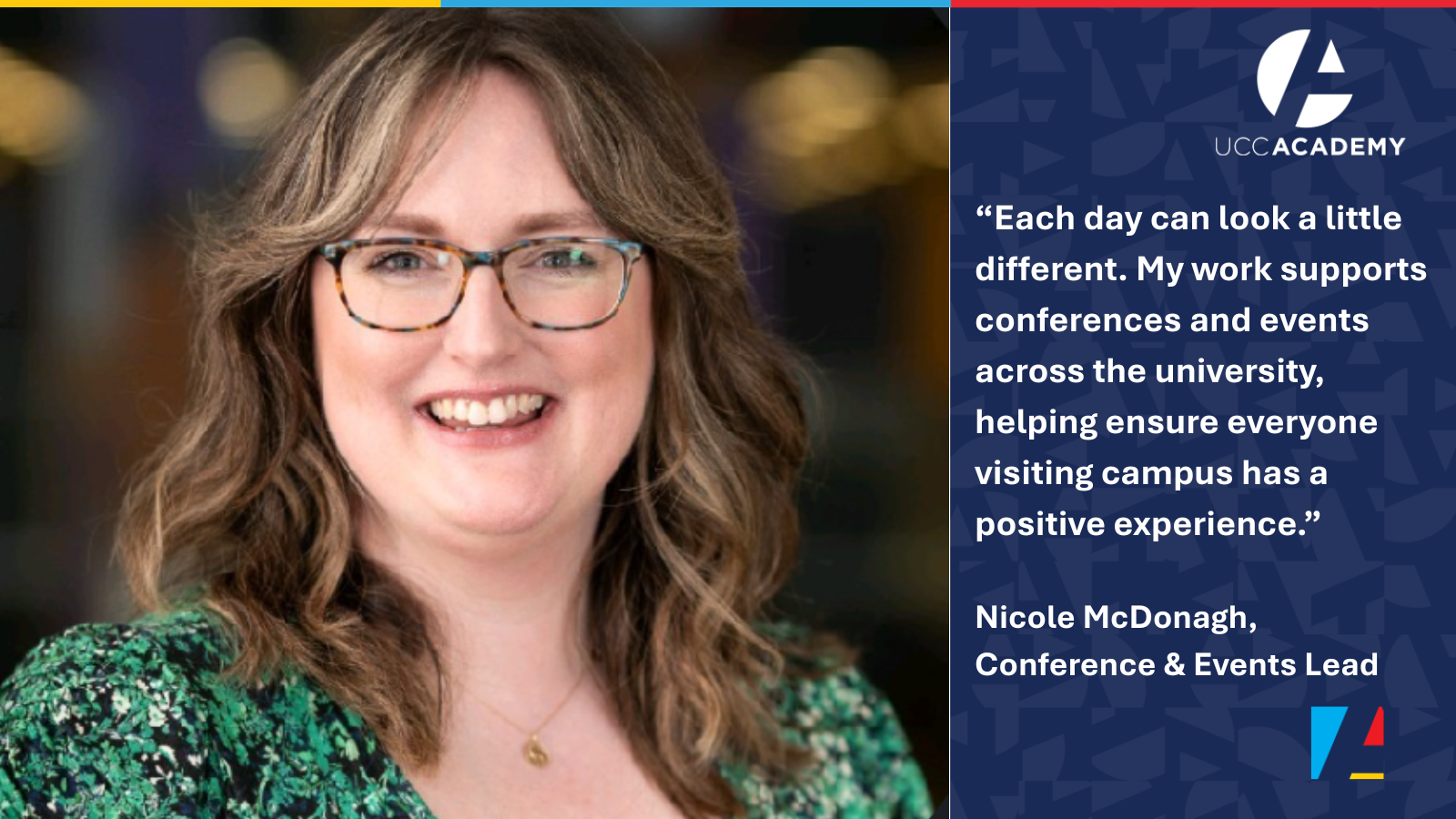 A women, smiling wearing a green top and glasses looks towards camera
