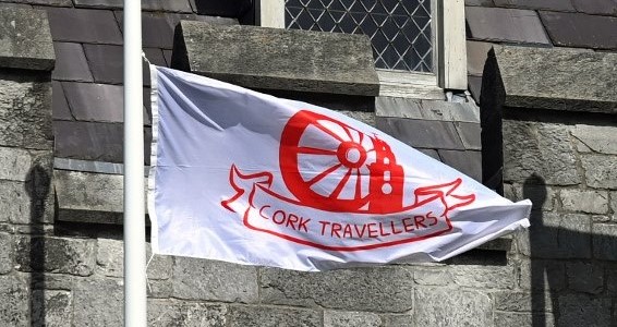Traveller Pride Flag raised on main quadrangle flag poles in UCC for Traveller Living History Event.