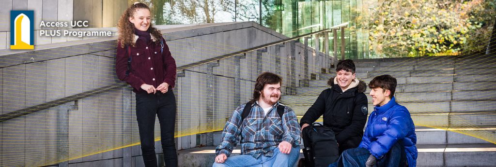 PLUS Programme Decretive Banner |  Four students by the steps of UCC
