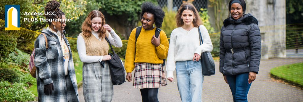 PLUS Programme Decretive Banner | Four Students walking by the Quad UCC